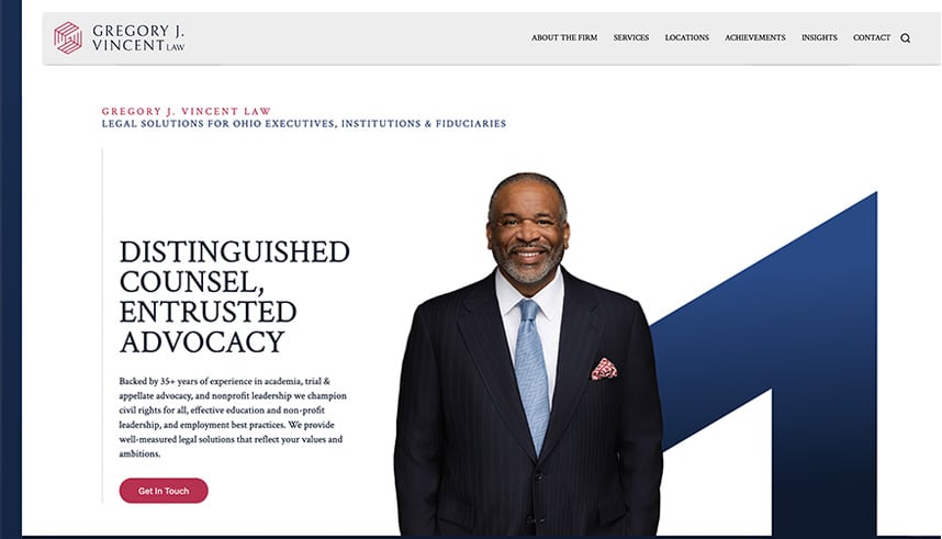 A professionally dressed man in a dark suit and red tie stands smiling in front of a white background with blue geometric shapes. Text on the left reads “Distinguished Counsel, Entrusted Advocacy” for Gregory J. Vincent Law.